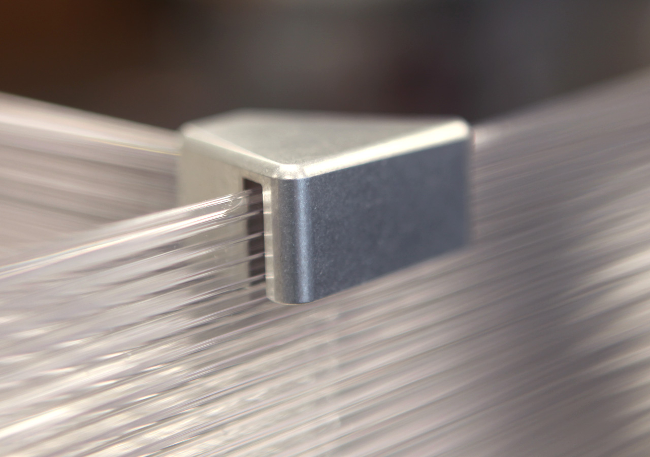 Detail of aluminum hardware joining plexiglass panels